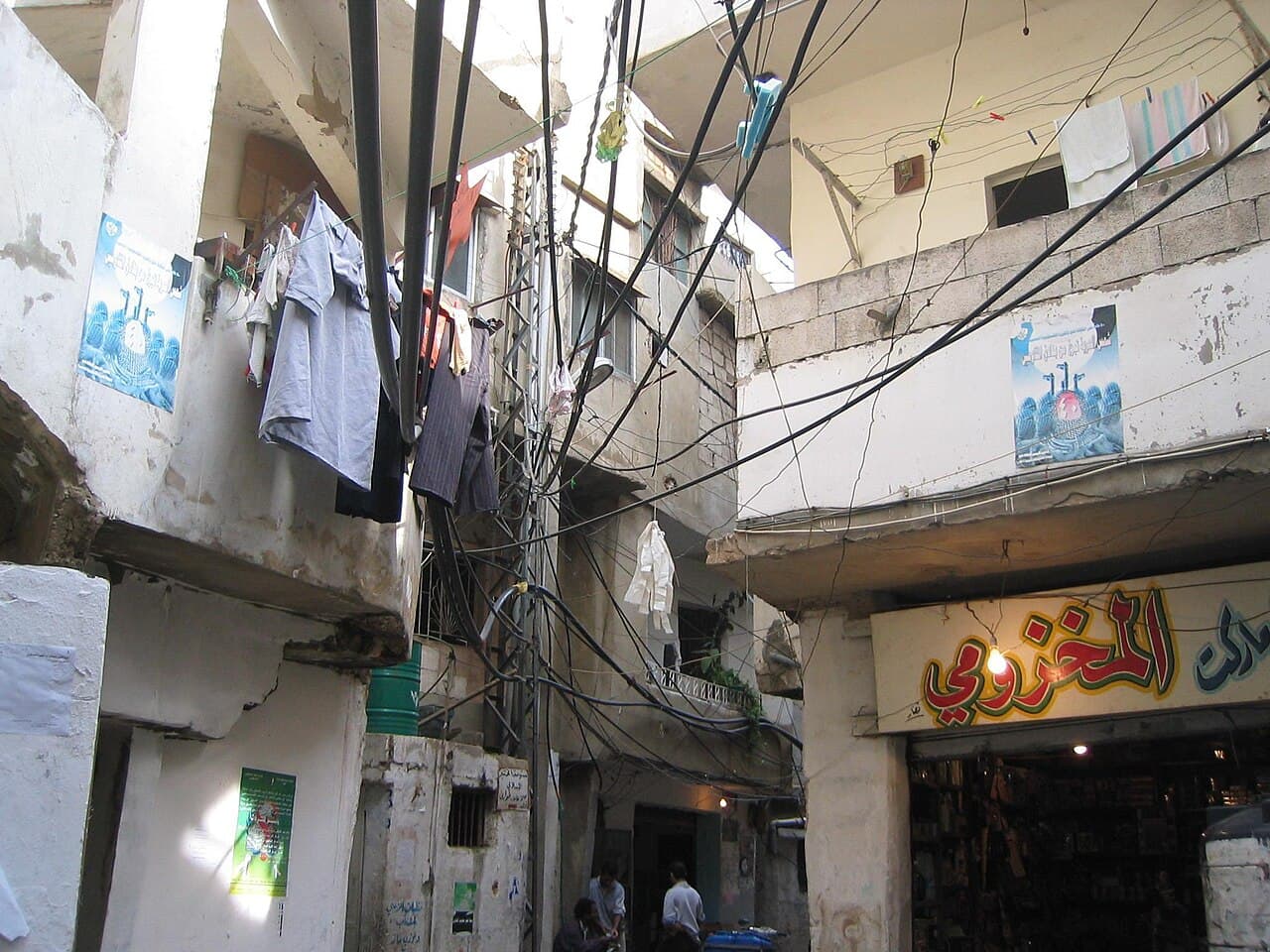A dense tangle of infrastructure wires in Shatila
